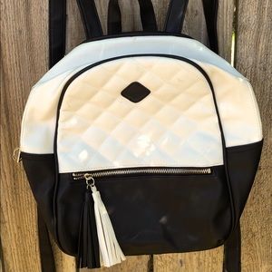 Small black and white backpack